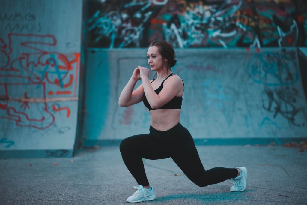 pexels-photo-1582161 Woman Stretching Beside Wall
